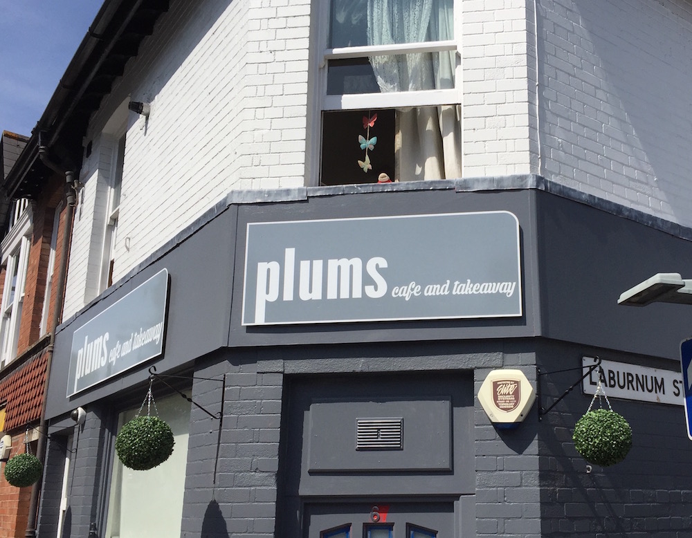 Torquay based cafe sign in grey - Sign Art Signwriters